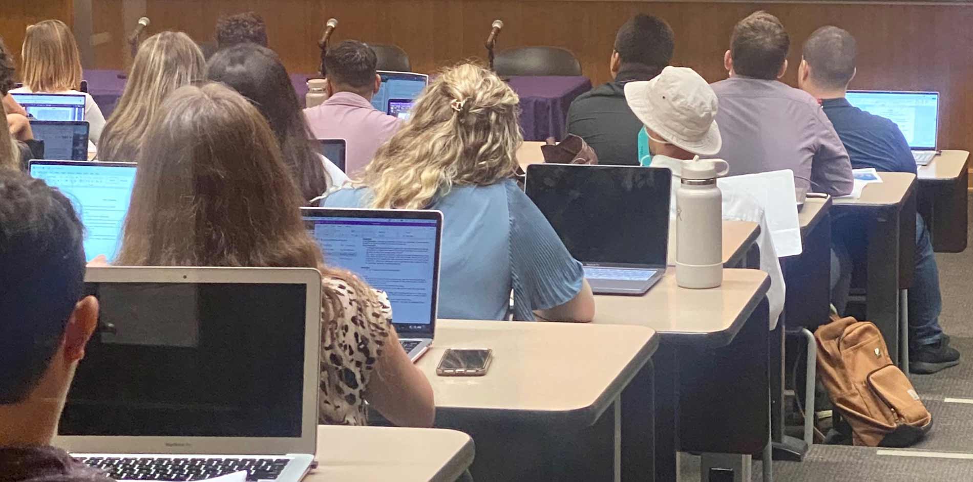 students on laptops during a lecture at California Western School of Law