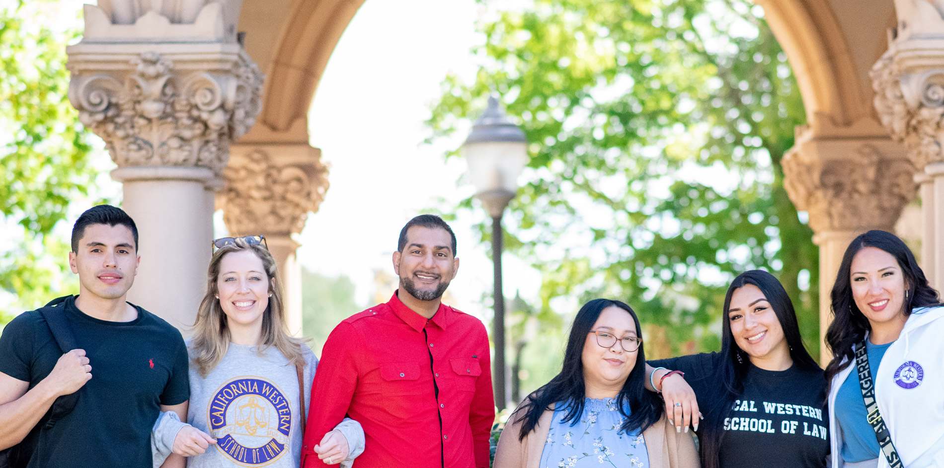 Students smiling while talking at Balboa Park