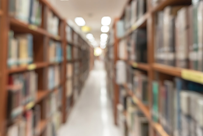 blurred library stack of books