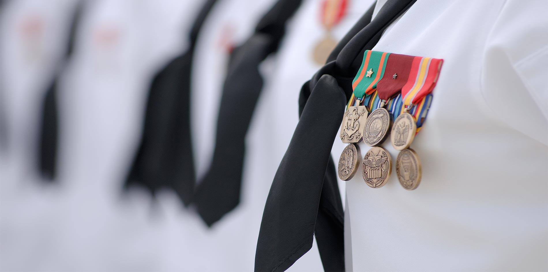 servicemember wearing with medals and tie