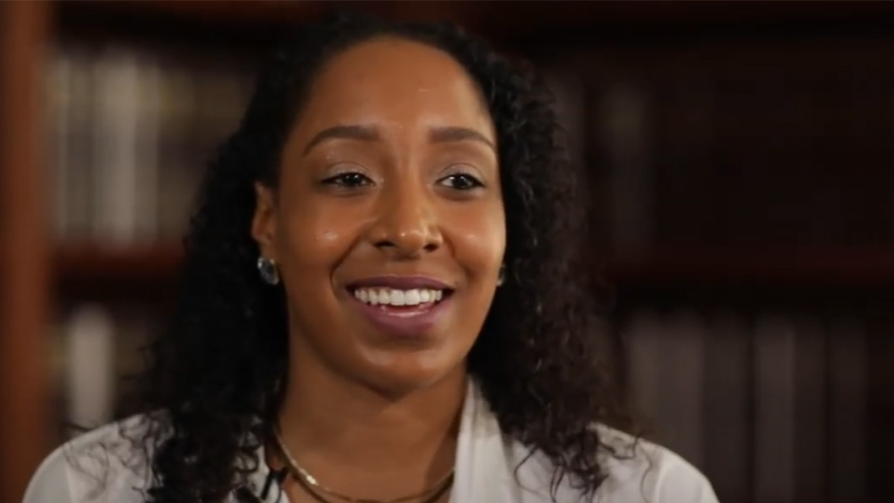 Female student being interviewed about scholarships