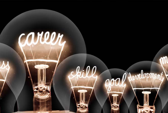 Light bulbs with words for career development