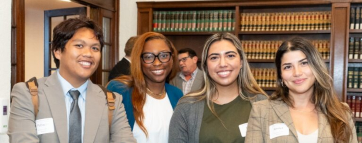 Students dressed in business attire in reading room