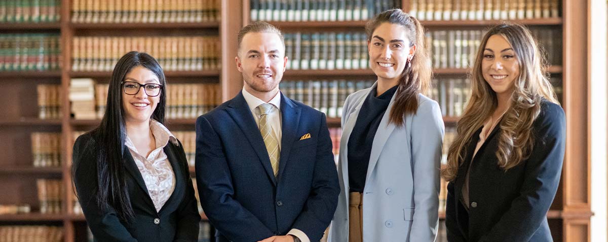 Students dressed in business attire in reading room