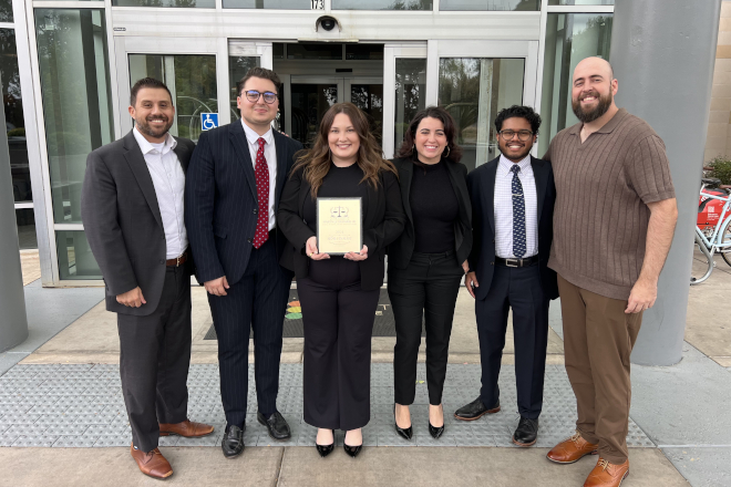 CWSL Trial team holds up trophy