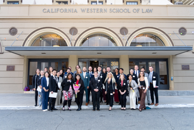 CPDO Staff and Honor Societies inductees gather in front of a California Western School of Law building
