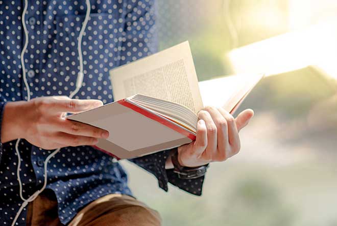 person reading book 