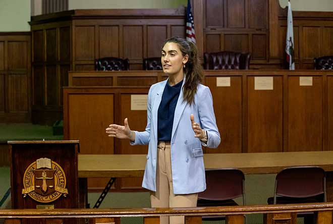 female student talking to jury