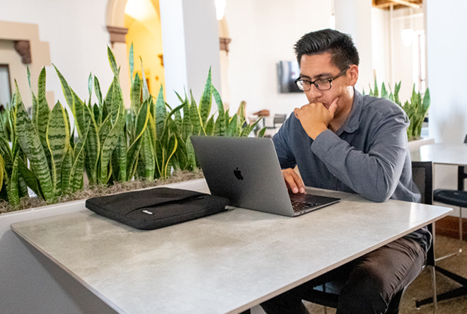 Male student studying in the new second floor lounge