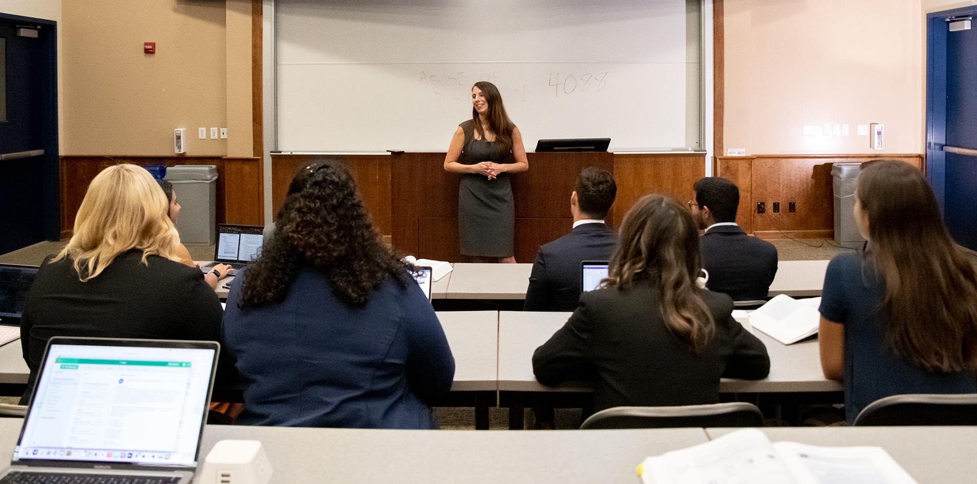 Students listening to Professor Erin Sheley during a lecture