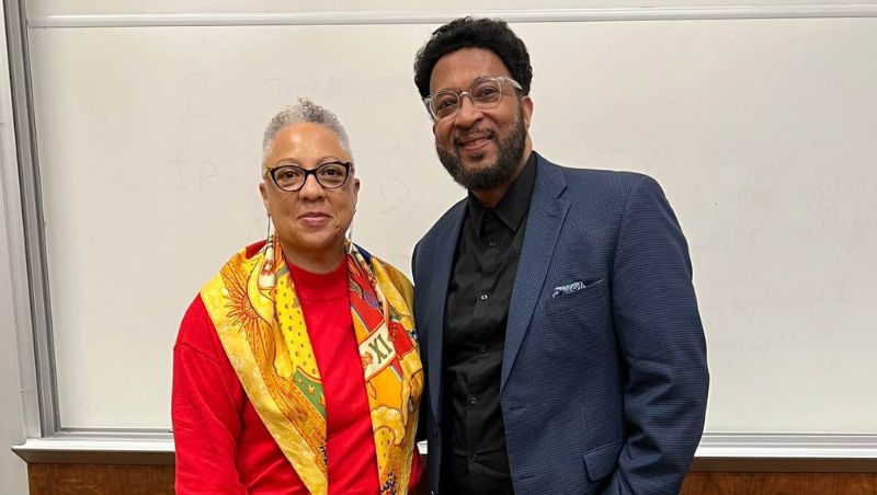 Anthony Cook and Dean Scott pose for a photo following the engaging talk.