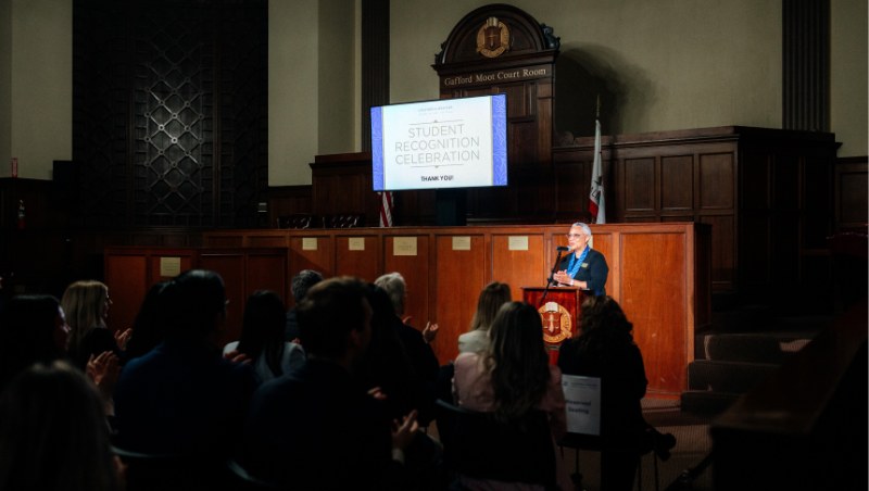 President and Dean Sean M. Scott gives opening remarks at CWSL's Student Recognition Celebration.