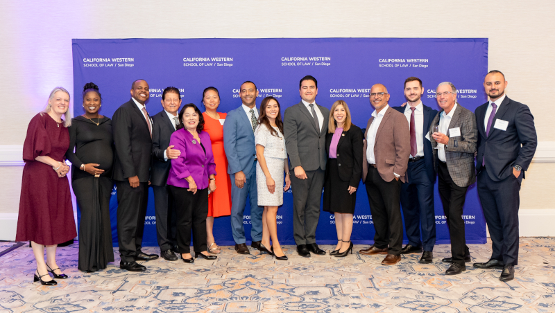 San Diego County District Attorney Summer Stephan, and members of the of DA's office celebrating with Agustín Peña '12