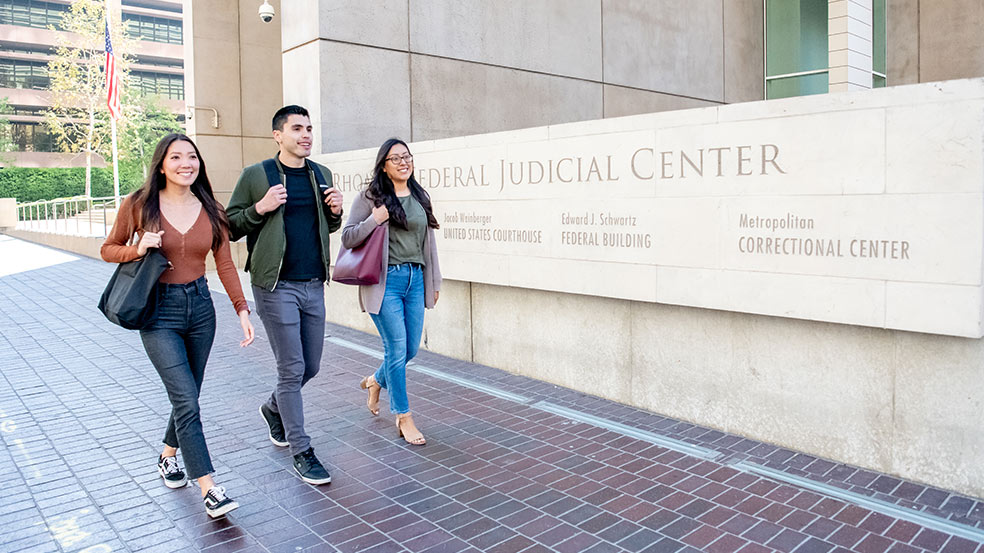 students walking near federal courthouse complex in downtown san diego