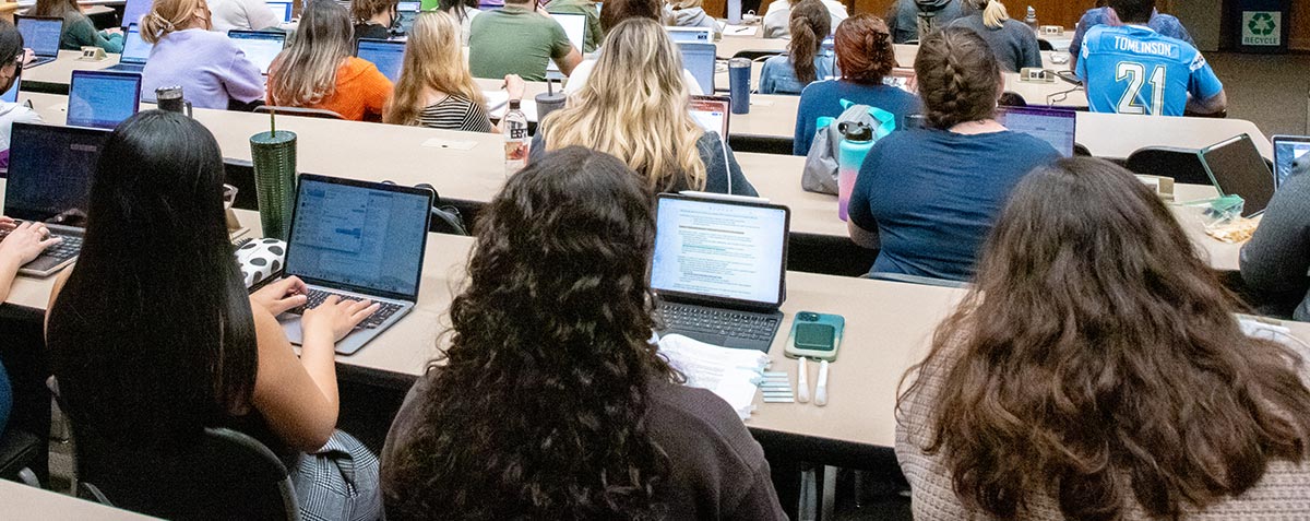 students with laptops in lecture at California Western School of Law
