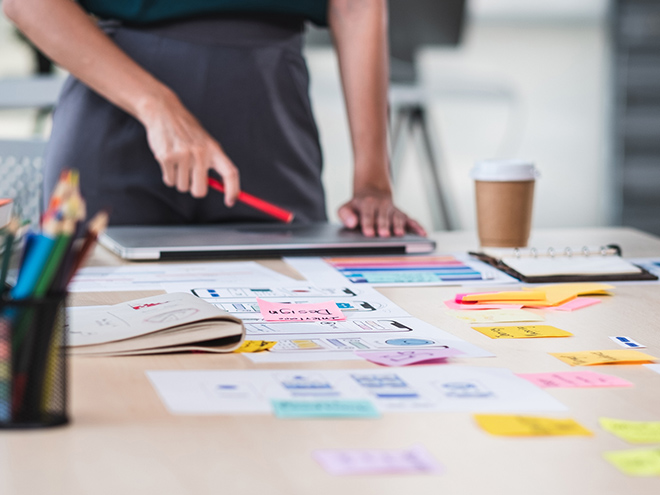 Table with post its and career plan 