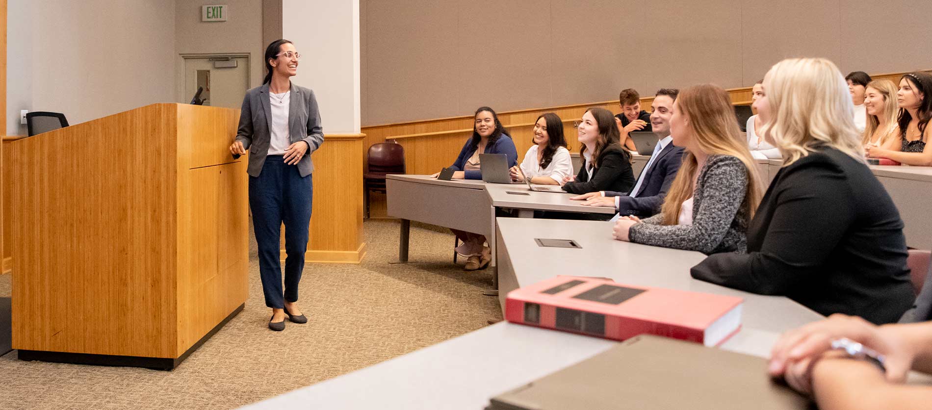 Students listening to Professor Pooja Dadhania during a lecture