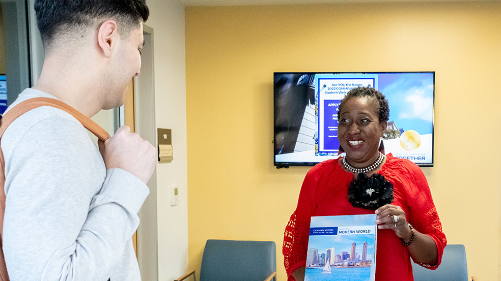 Admissions staff member meeting with student