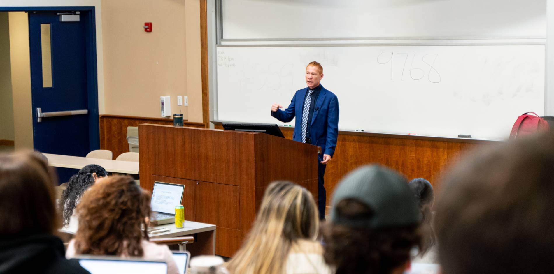 Students listening to Professor Shawn Fields during a lecture